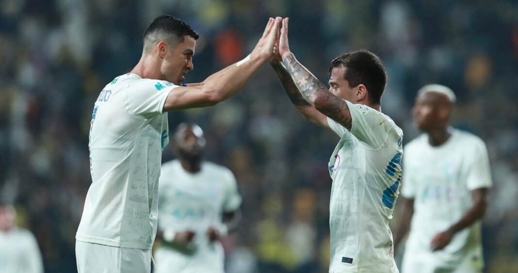 Cristiano Ronaldo e Otávio celebram