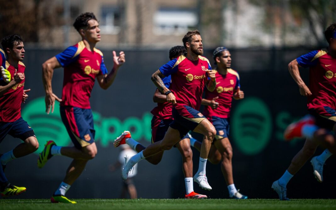 Atletas do Barcelona no treino